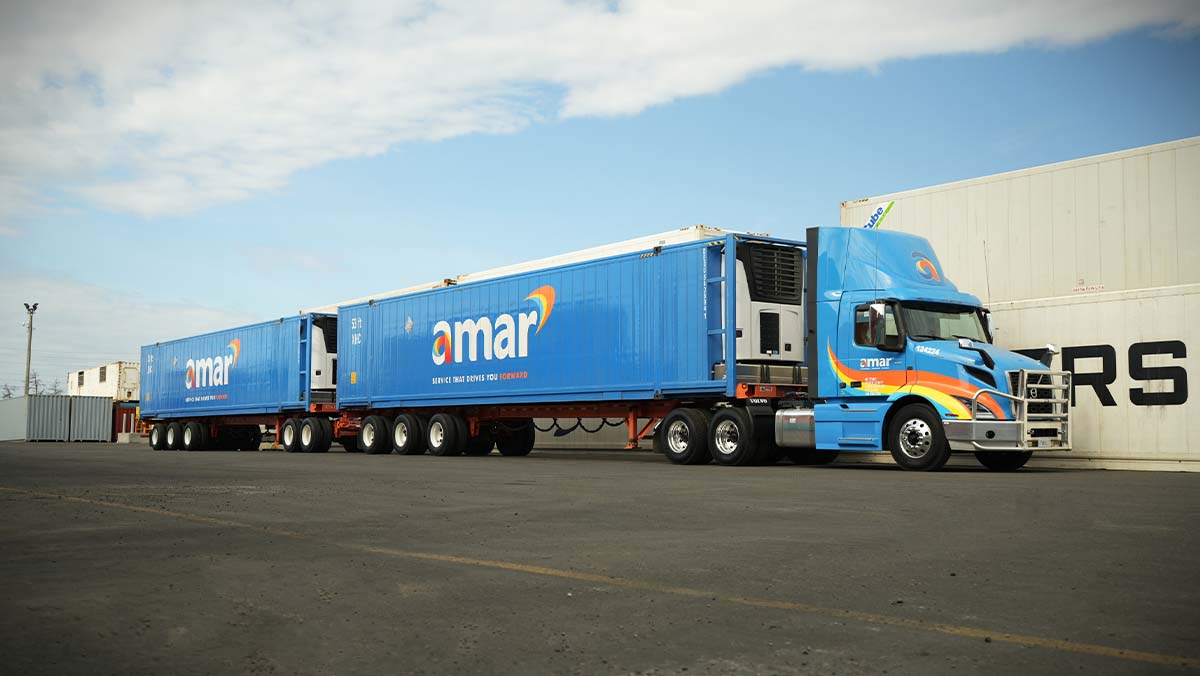 Amar Group LCV truck transporting two Amar 53’ containers