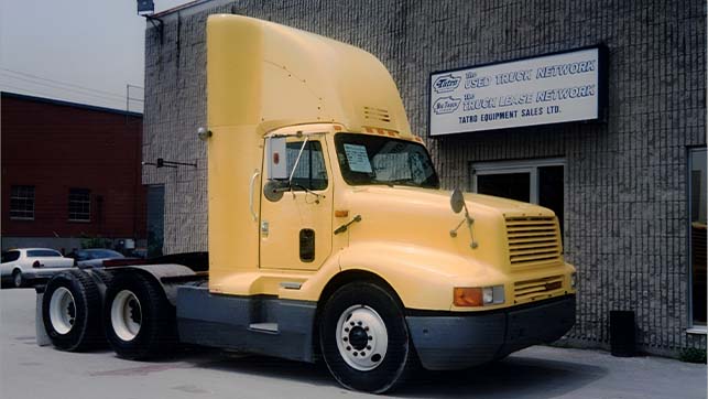 Sideview of 1996 yellow trucking cab