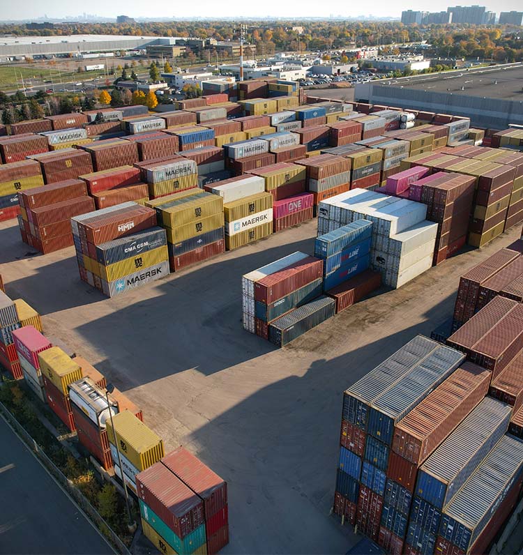 Amar container storage yard filled with stacks of dry and temperature-controlled containers