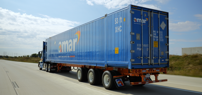 Amar Group container being transported over North American highway