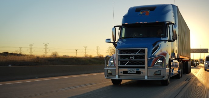 Amar truck driving on highway